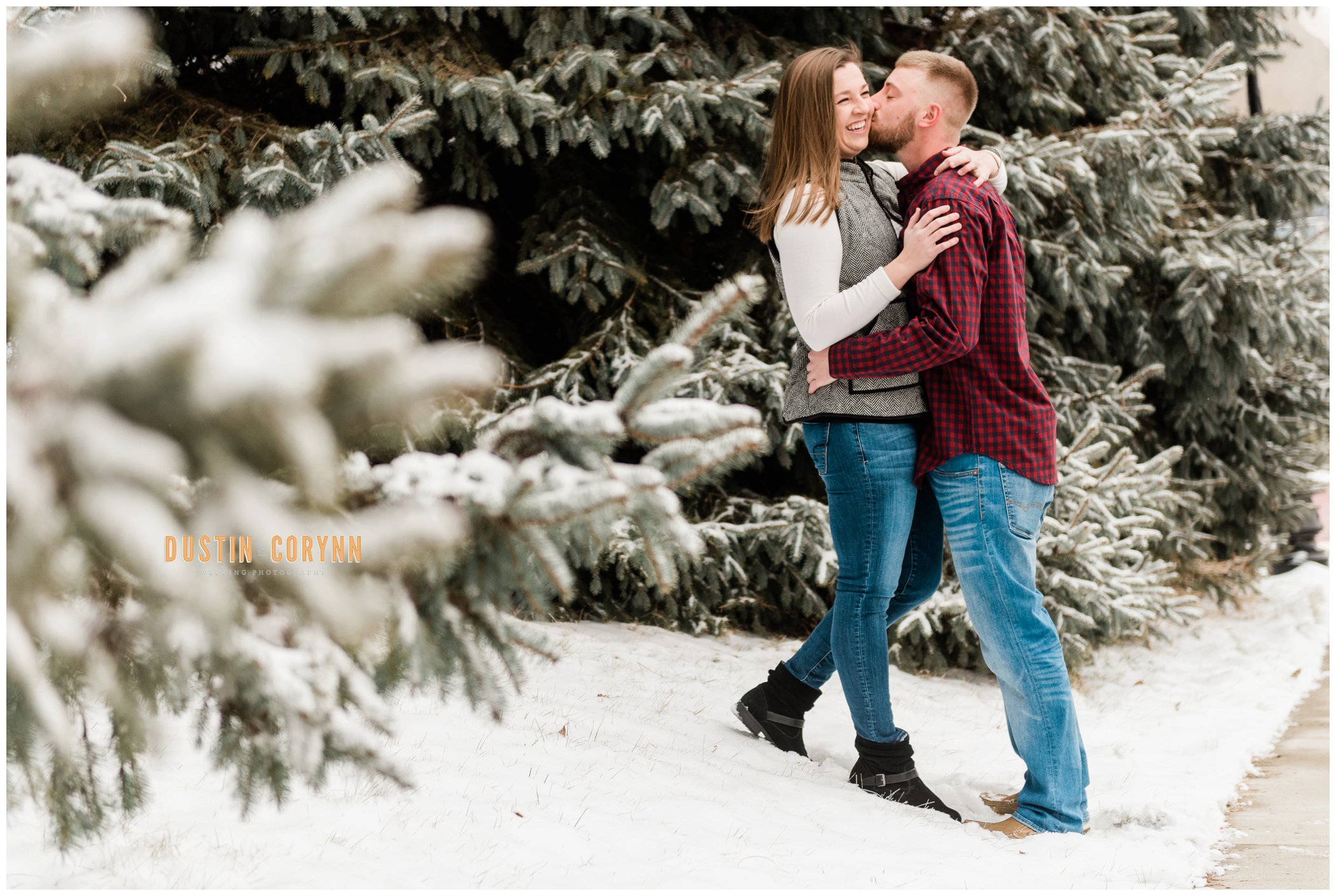 Kissing by the Snowy Pines