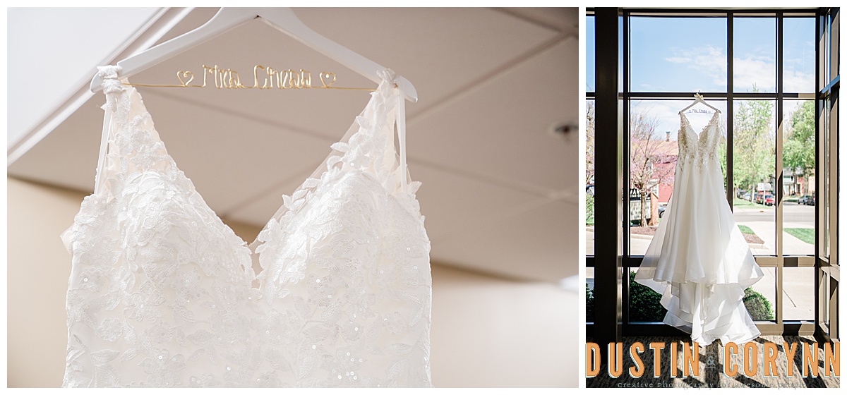 brides spring wedding dress detail photos with wedding dress on a white wooden hanger in a window