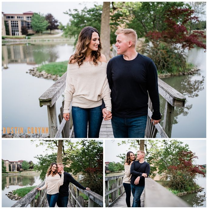 engaged couple holding hands and walking on a bridge together for their outdoor engagement outfit ideas