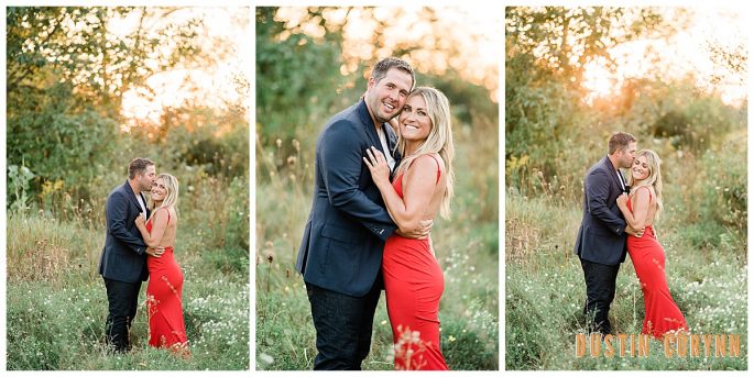 Indianapolis best wedding photographers capture engagement session in a meadow with engaged couple holding each other romantically