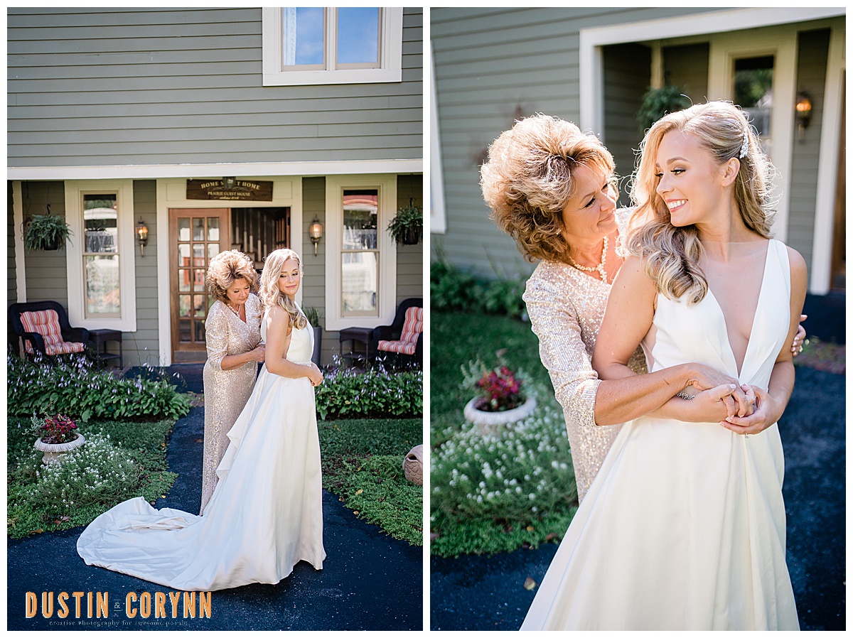 bride and her mother outside of their Fort Wayne wedding venue with mother zipping up her daughters wedding dress
