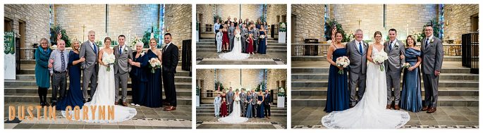 family and friends pose with bride and groom in the chapel for their wedding photos