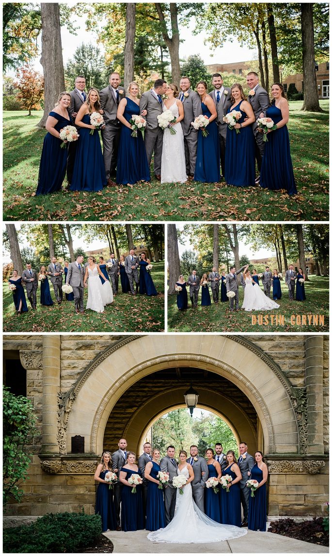 bridal party on the lawn of a church with the sun shining behind them through the tall native trees of Indiana