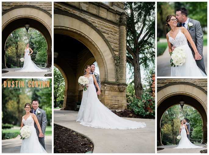 bride and groom in front of an arch with on the churches lawn with large trees in Indiana captured by best Fort Wayne wedding photographers