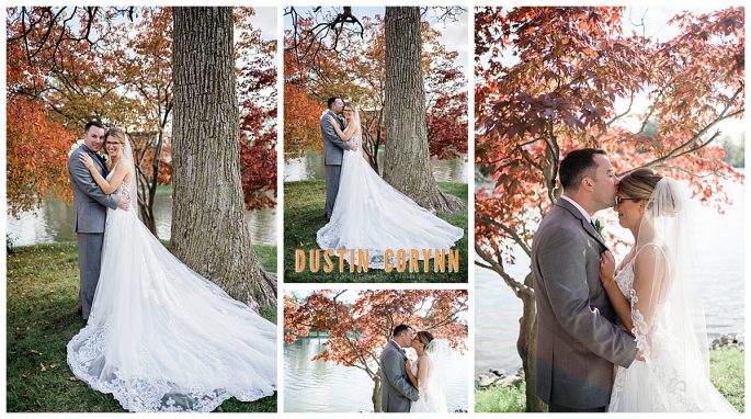 fall bridal inspiration with bride in a lace wedding gown standing on a lake with red leaf trees 