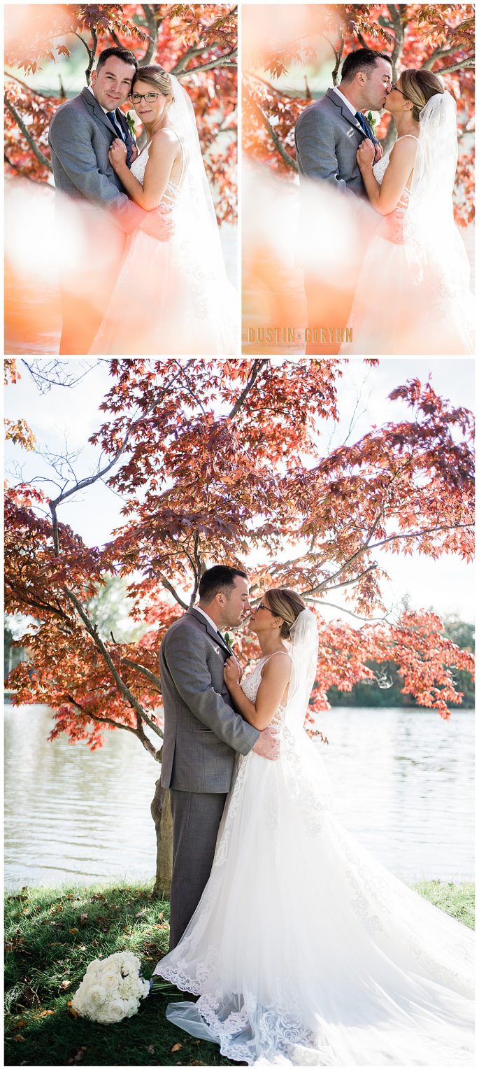 fall wedding photos with bride and groom standing next to a lake 