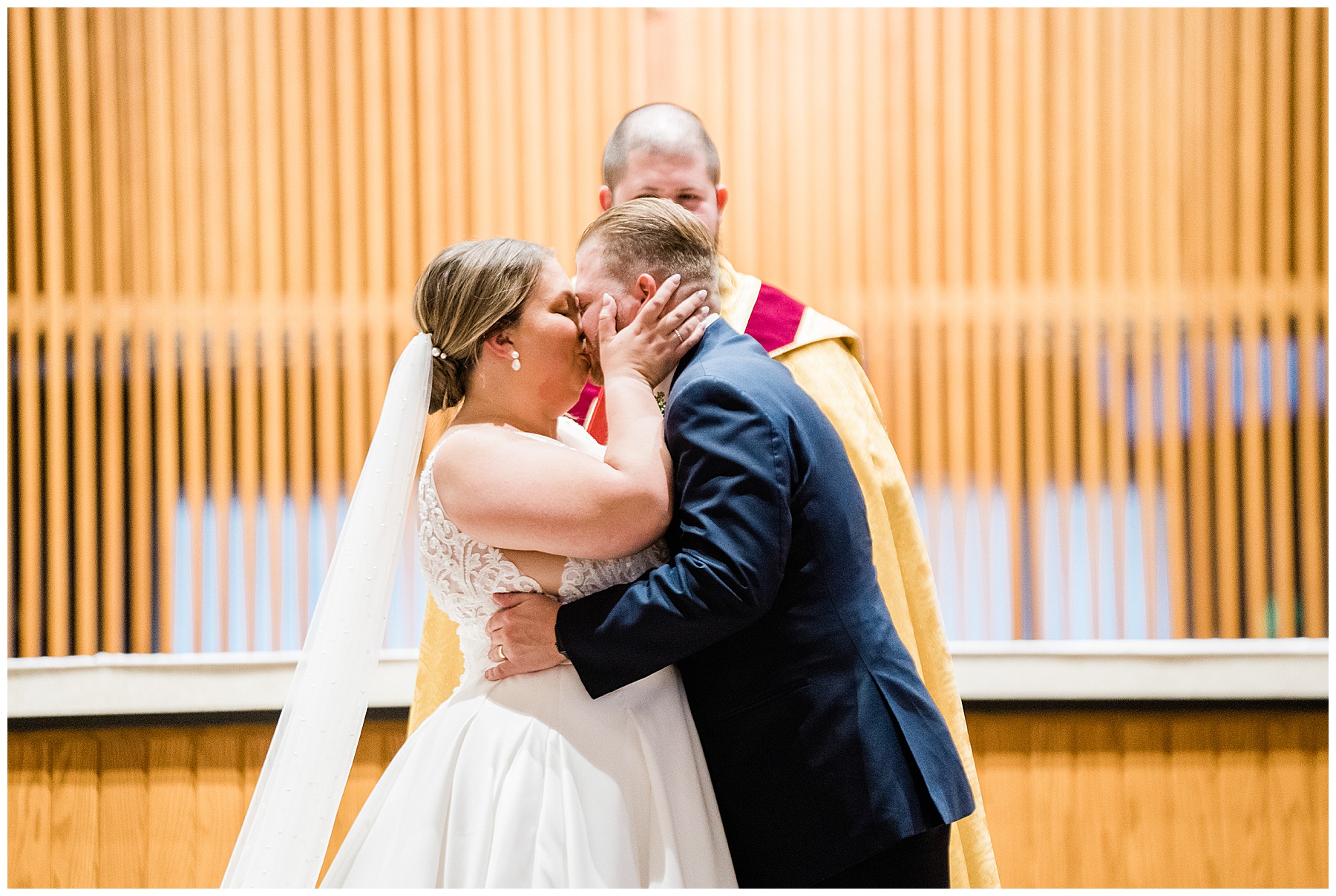 bride and groom kissing as husband and wife