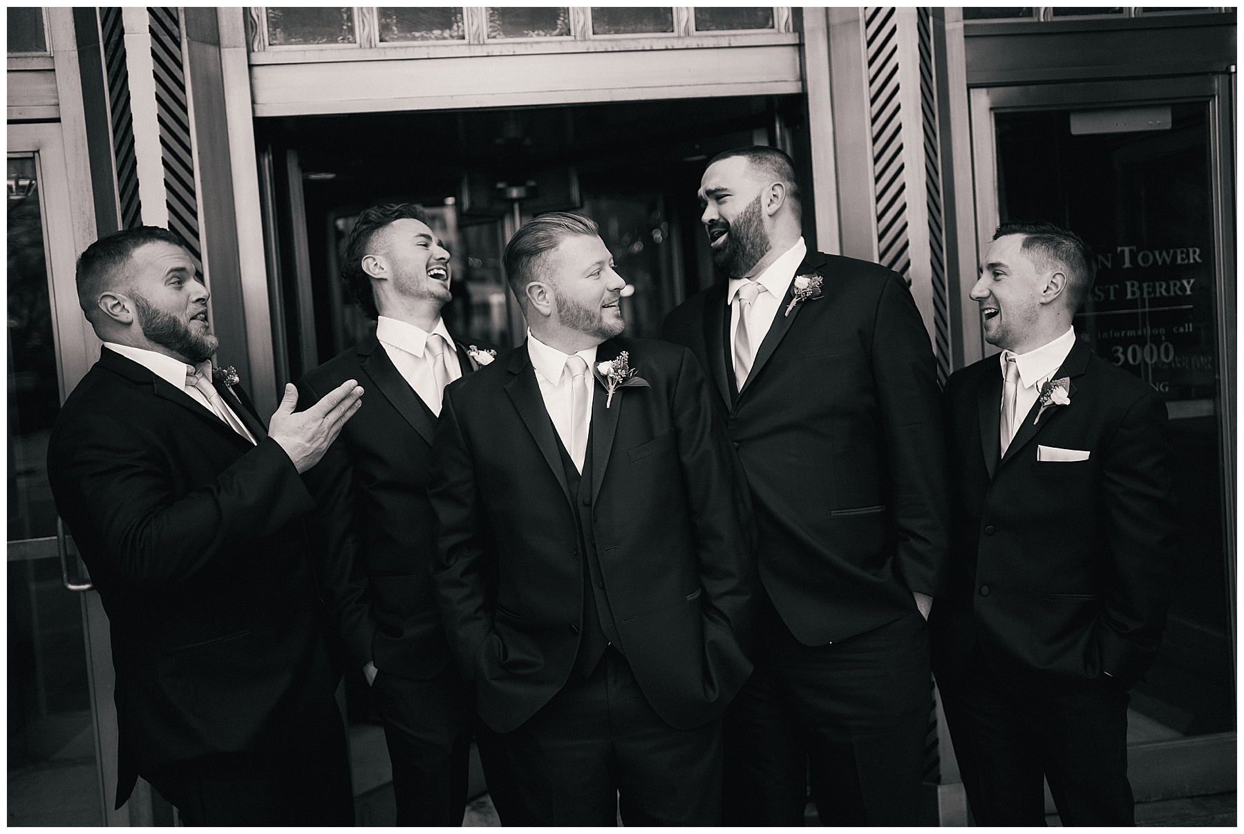 groom with groomsmen after st charles wedding