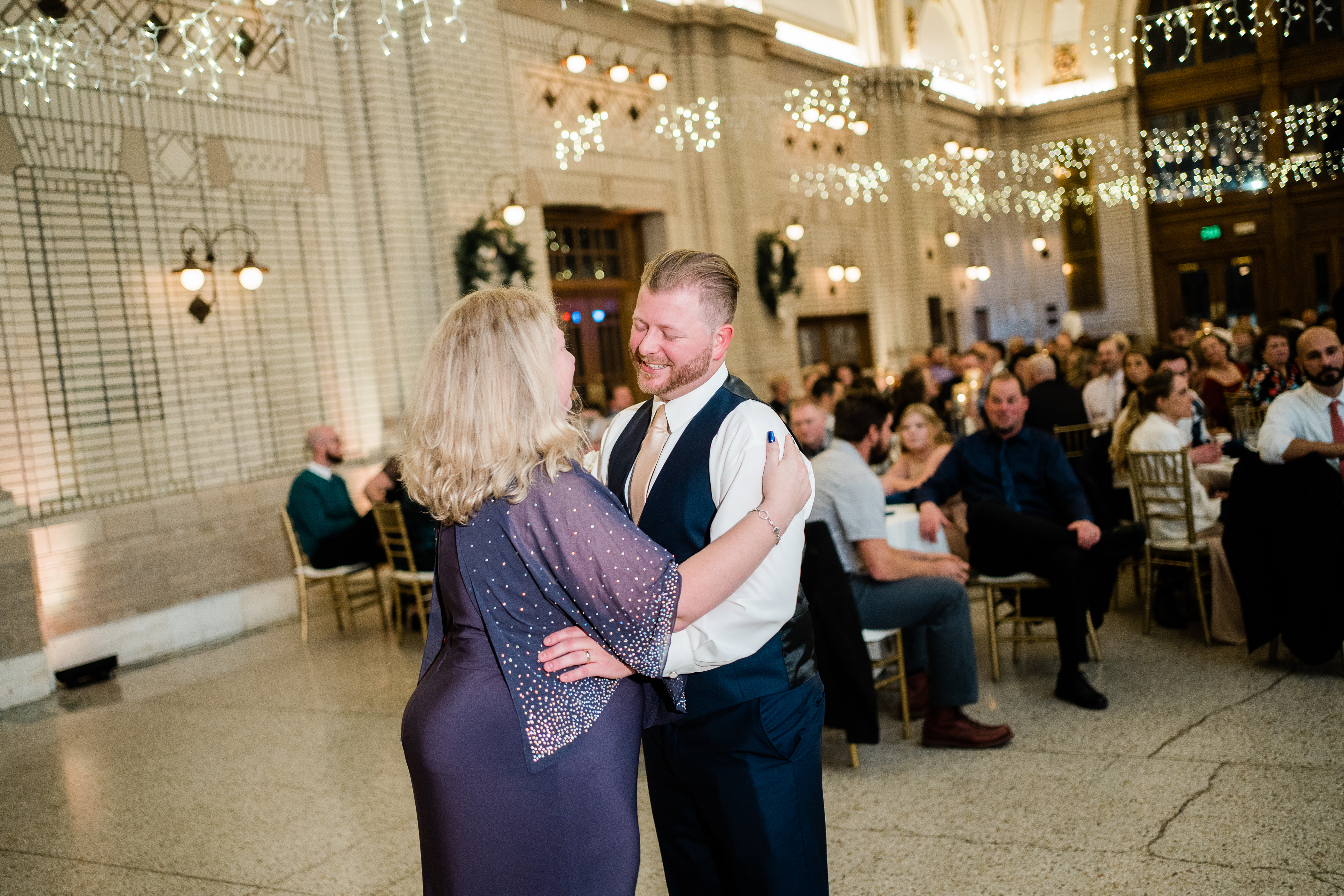 groom dancing with mother during mother-son dance