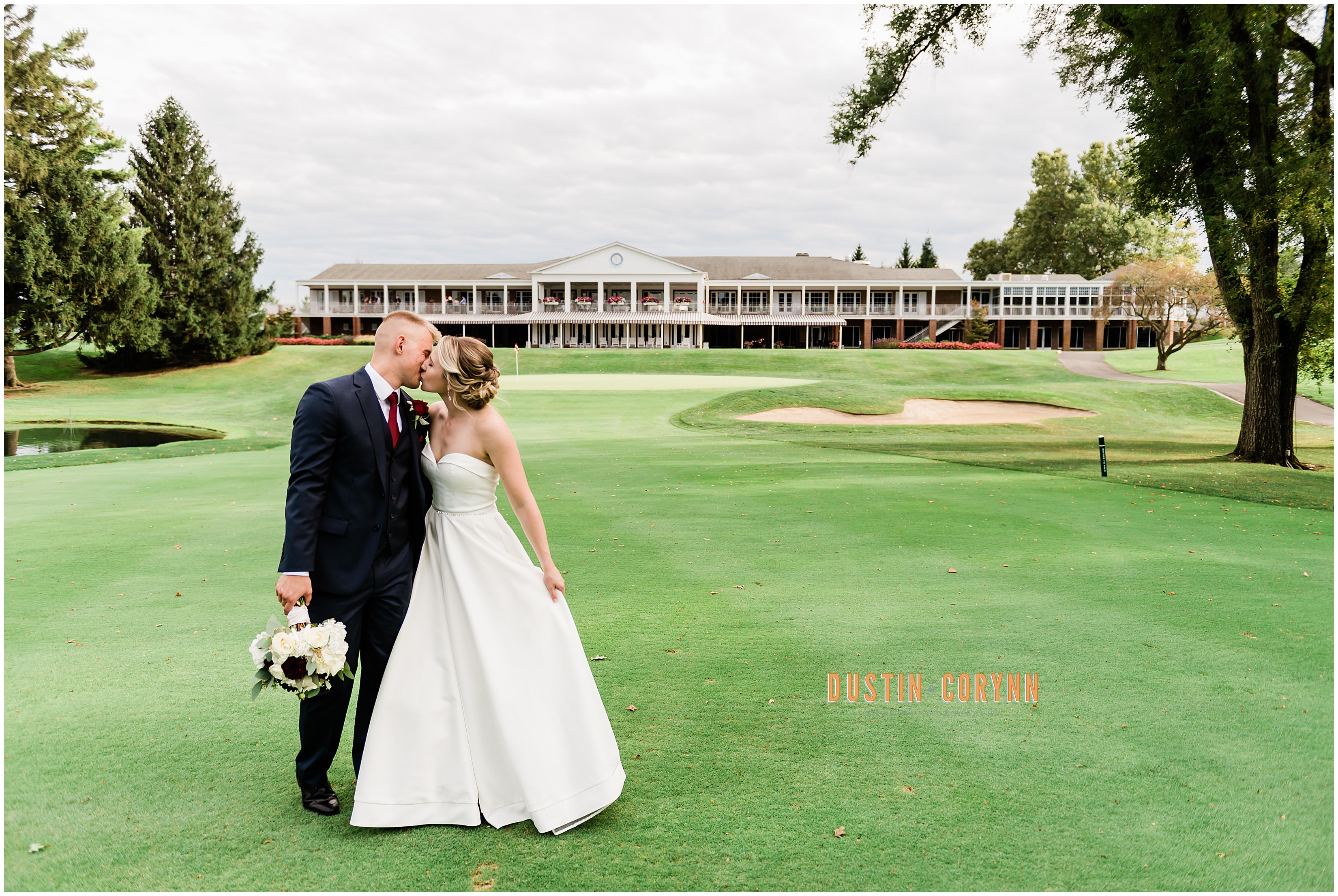 bride and groom on golf course 