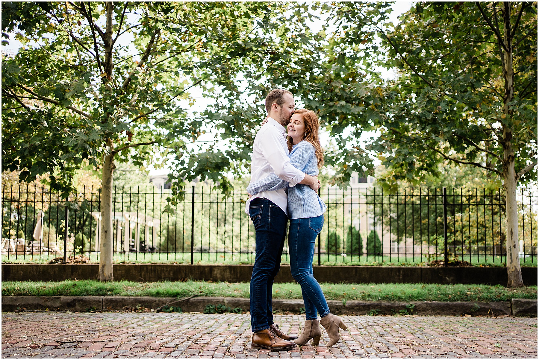 engaged couple hugging during Cincinnati engagement portraits 