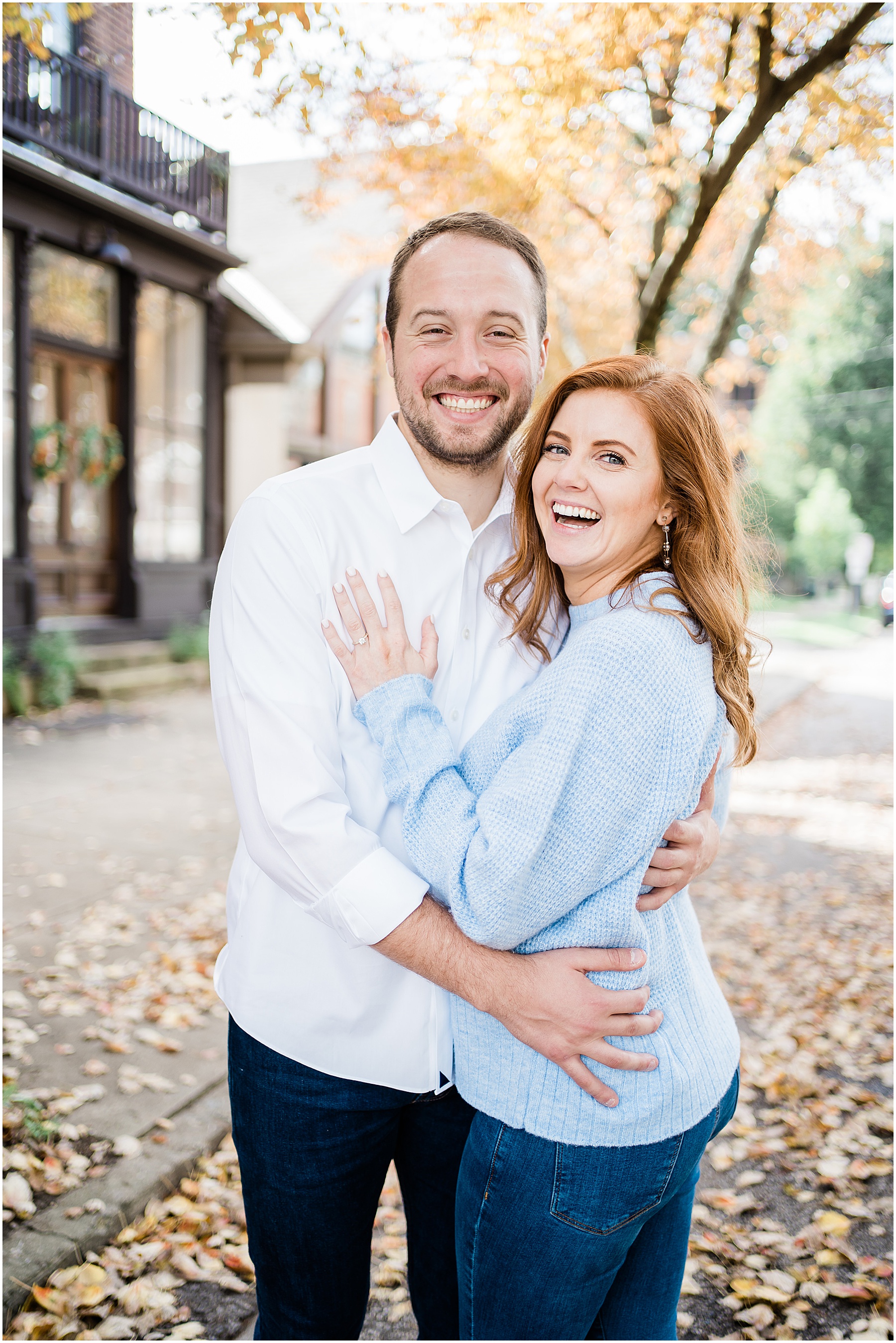engaged couple smiling during Cincinnati sunset engagement session 
