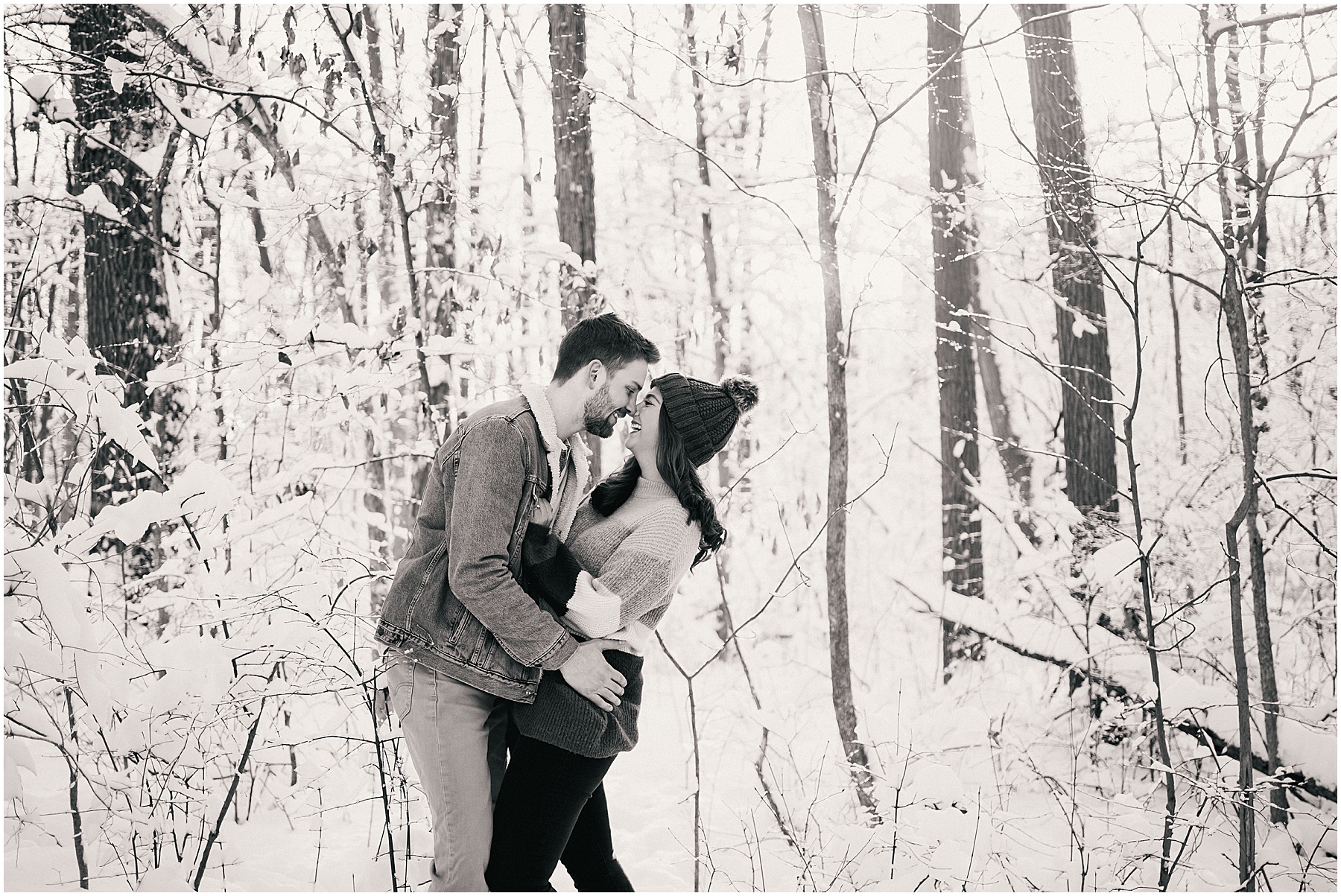 black and white portrait of snowy outdoor engagement session in Fort Wayne
