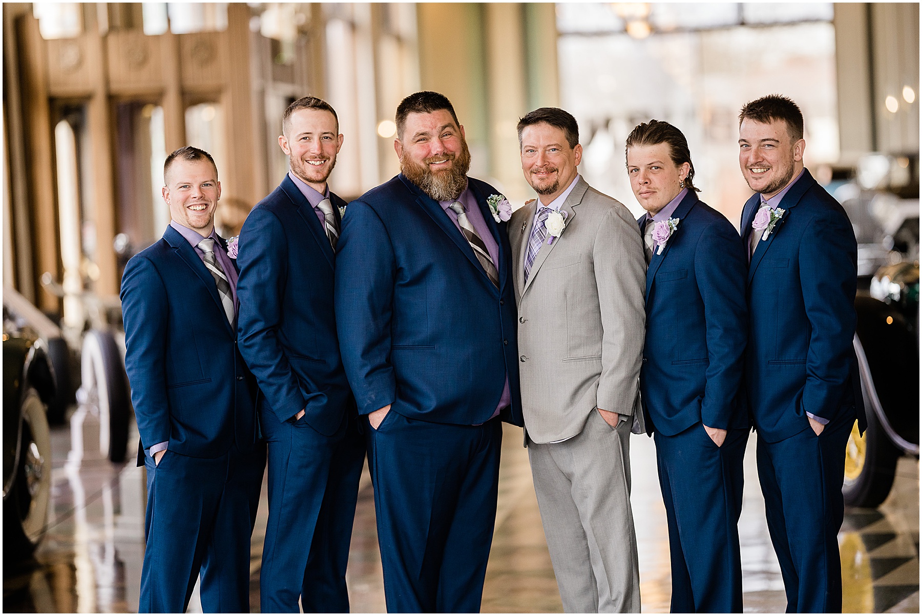 groom and groomsmen at auto mobile museum wedding