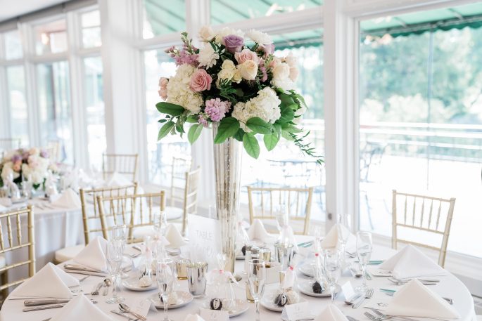 tall centerpiece with white and pink florals from top florists in indianapolis