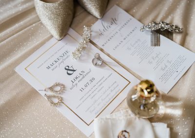 elegant wedding flatlay photo with bridal jewelry and shoes