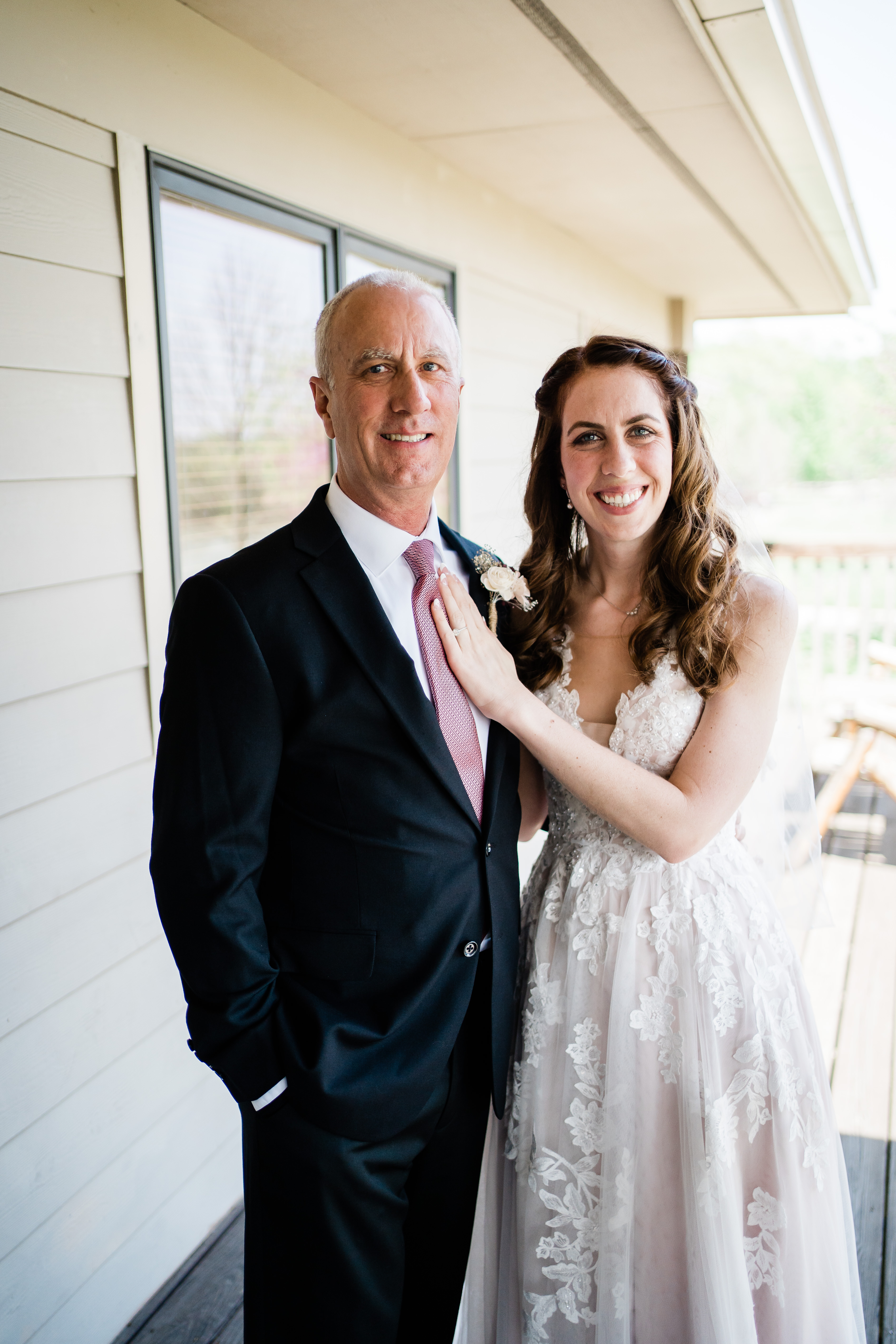 bride and her father posing together taken by Fort Wayne wedding photographer