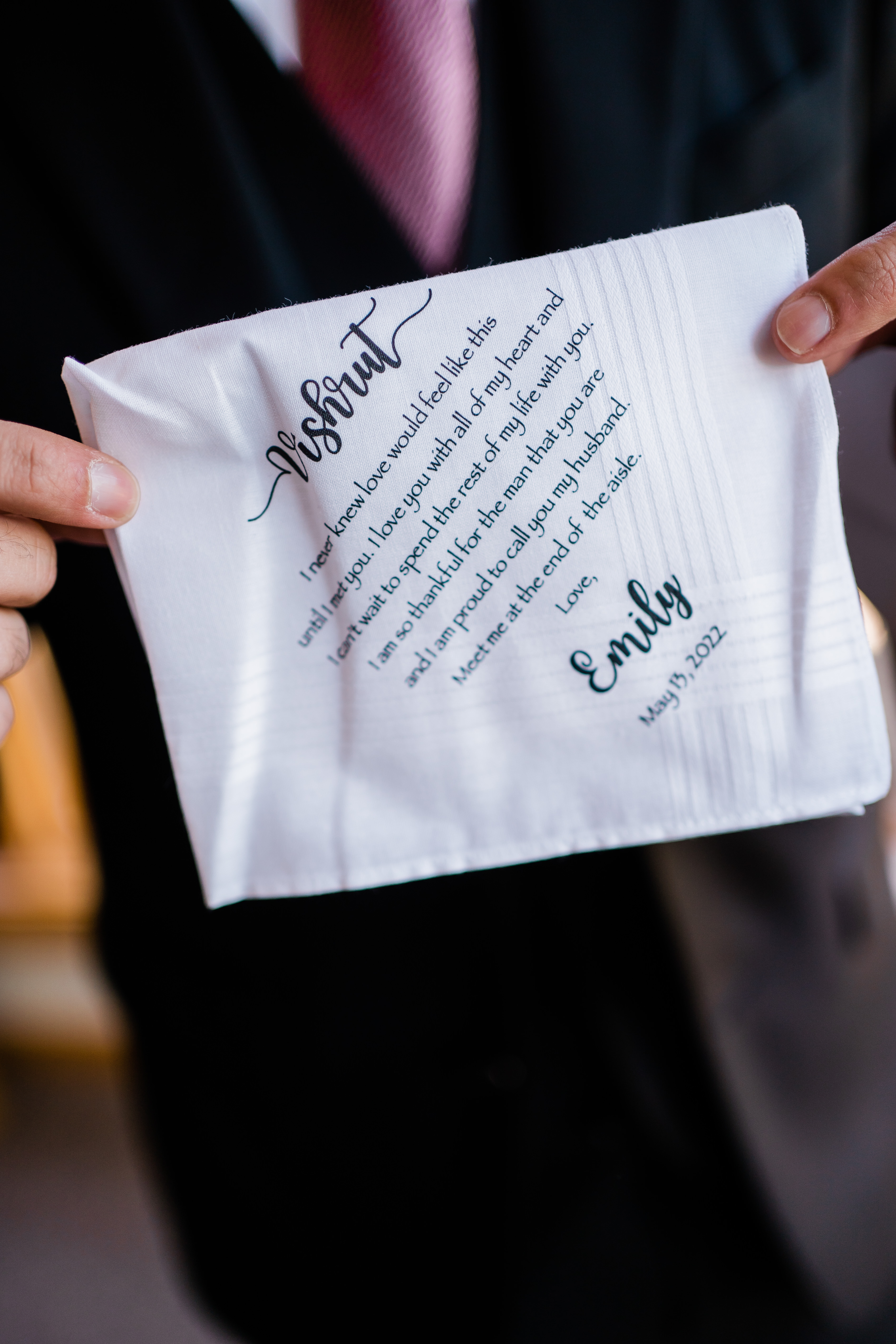 wedding gift from bride to groom of a white handkerchief with a custom note on it