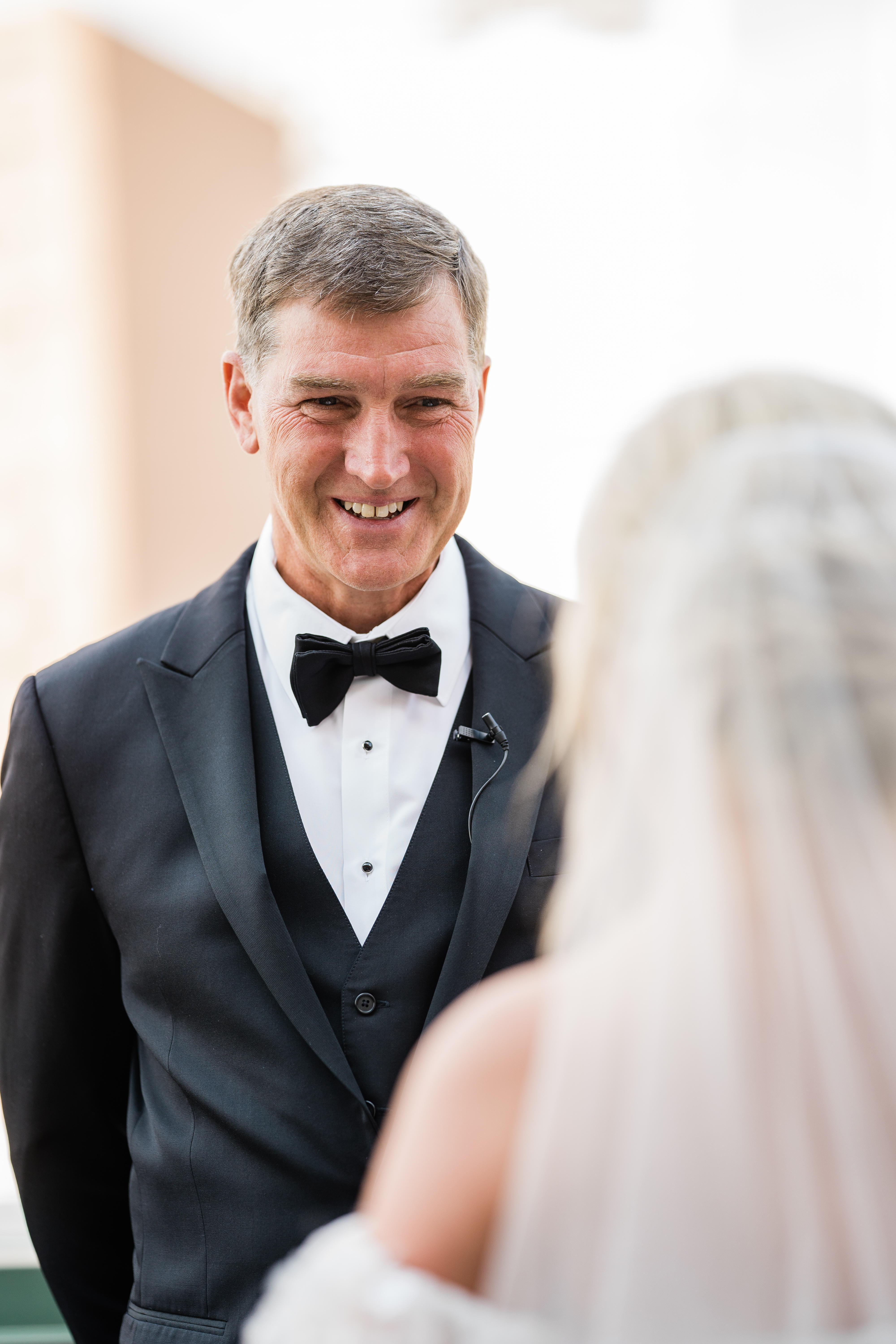 father of the bride has a first look with the bride taken by Fort Wayne wedding photographers