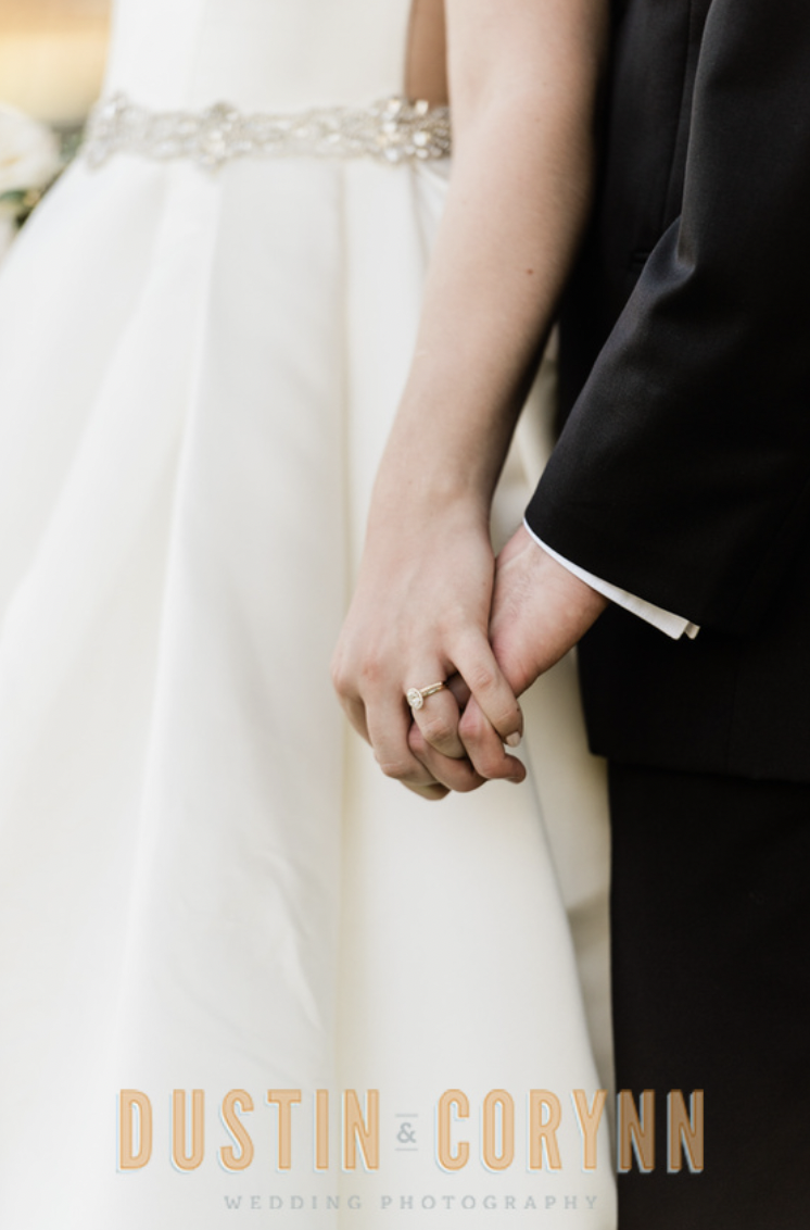 Indiana wedding photographer captures newly married couple holding hands