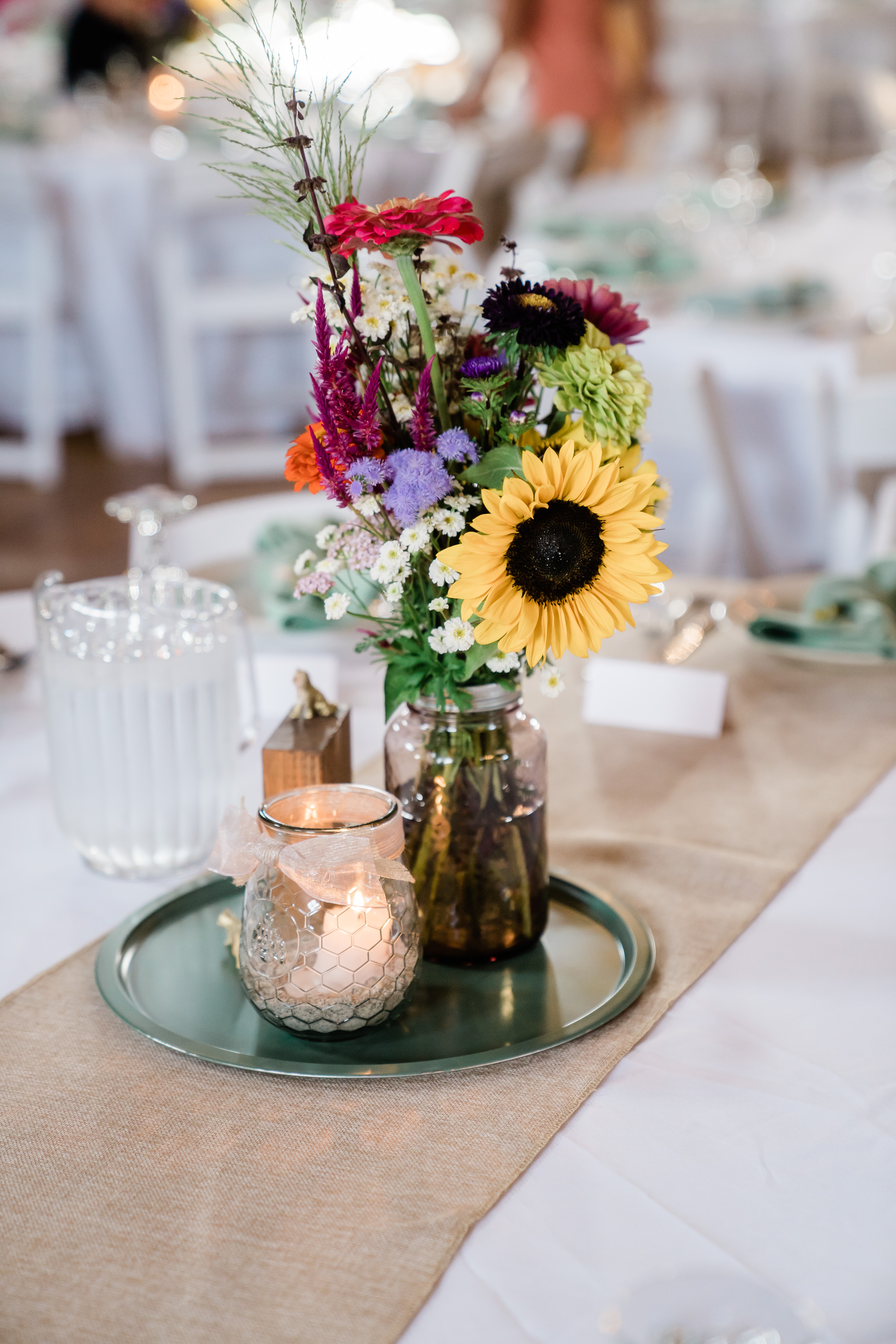 wedding centerpieces with sunflowers in glass jars