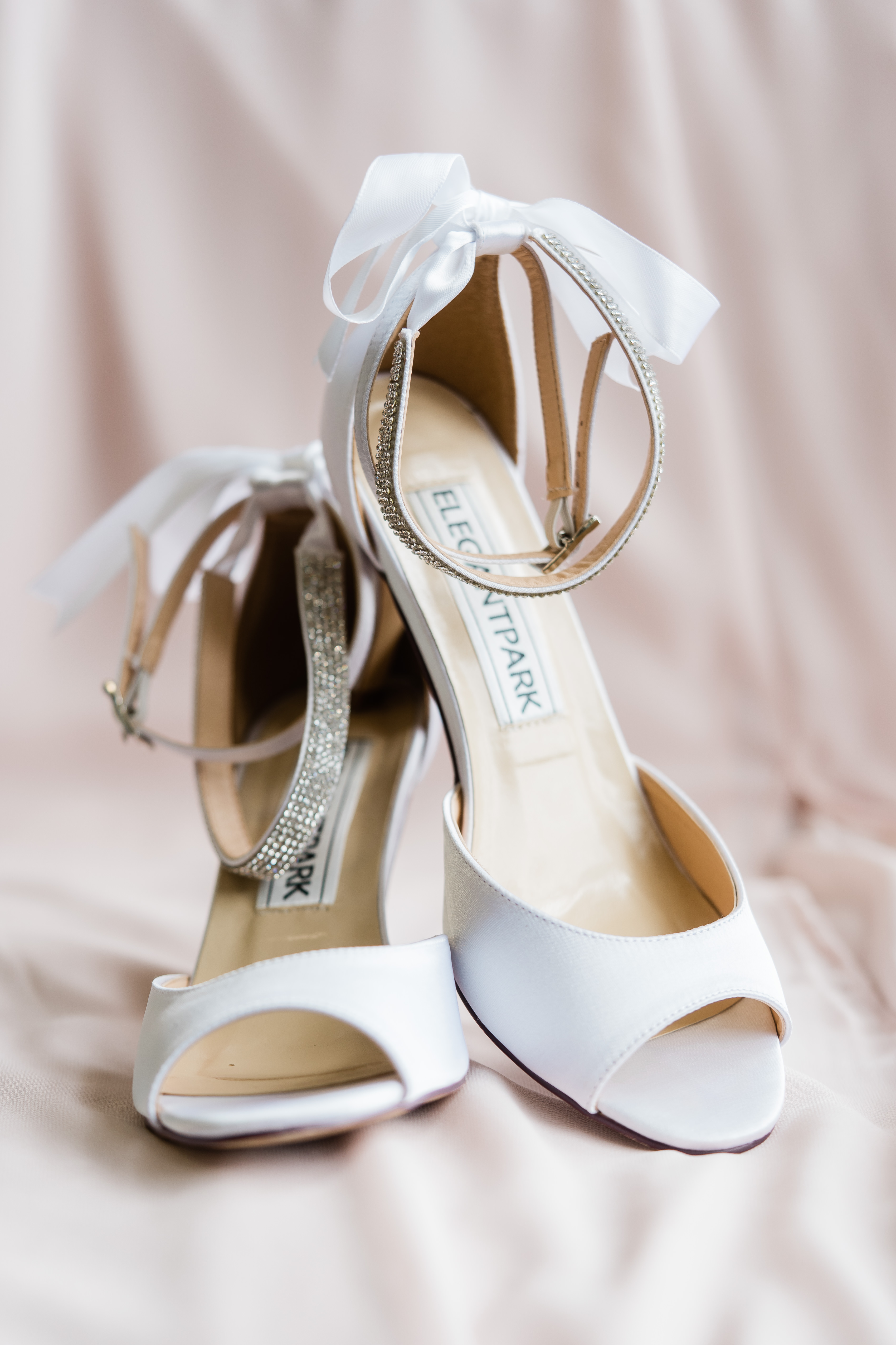Fort Wayne wedding photographer captures bridal shoes on modern ohio golf course wedding day