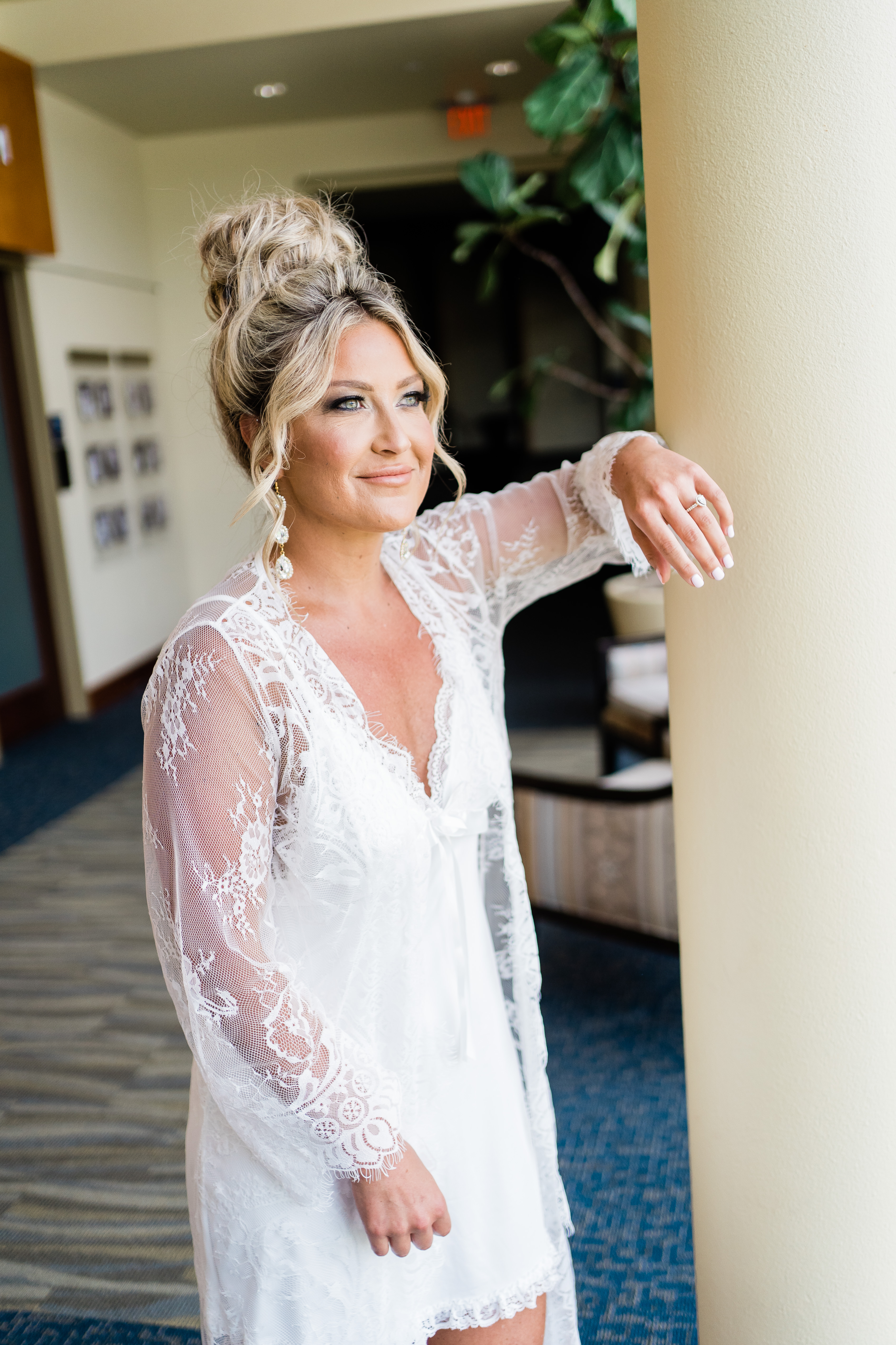 Indiana wedding photographer captures bride wearing robe and smiling