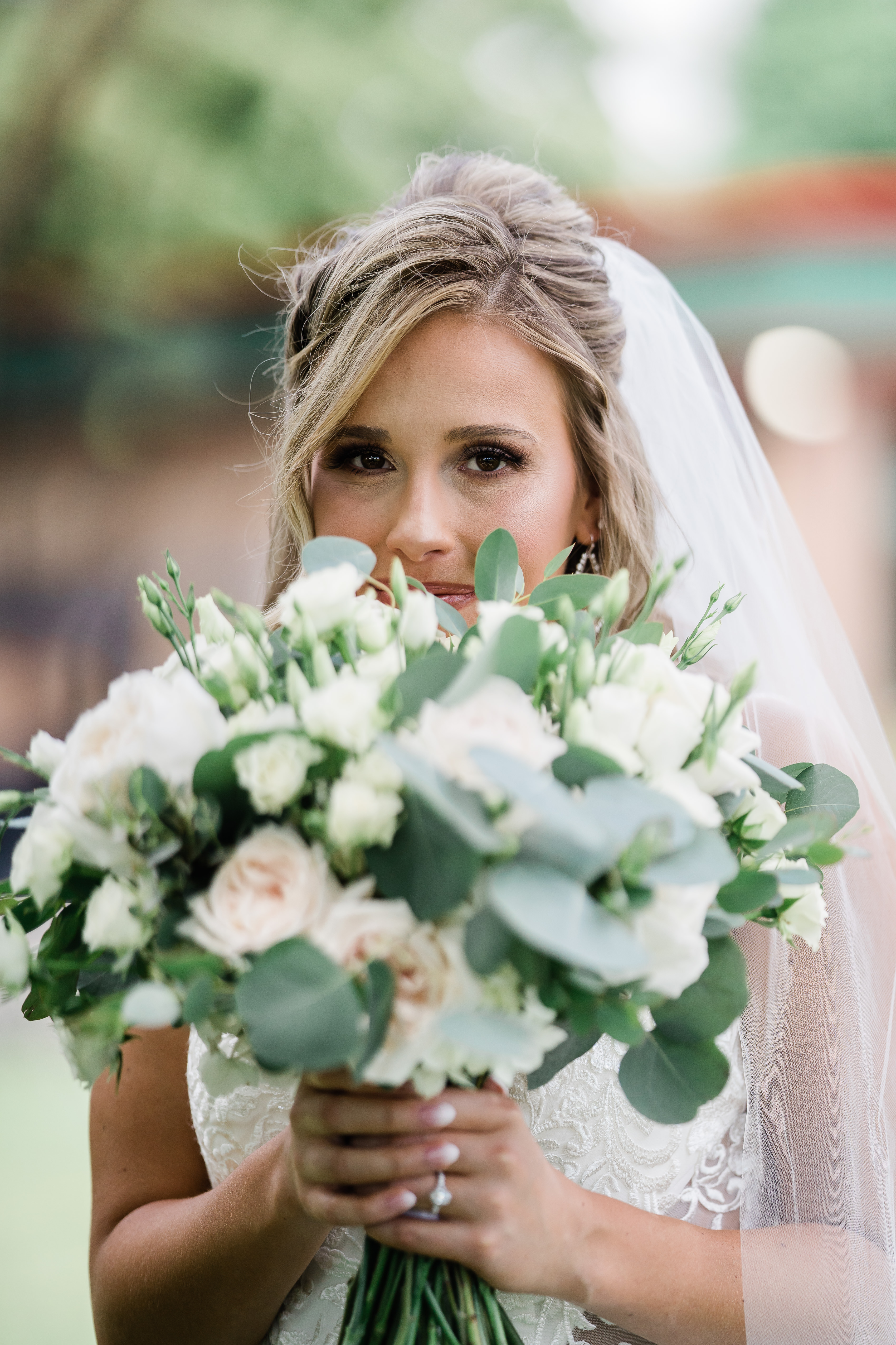 Fort wayne wedding photographers capture bride holding bouquet