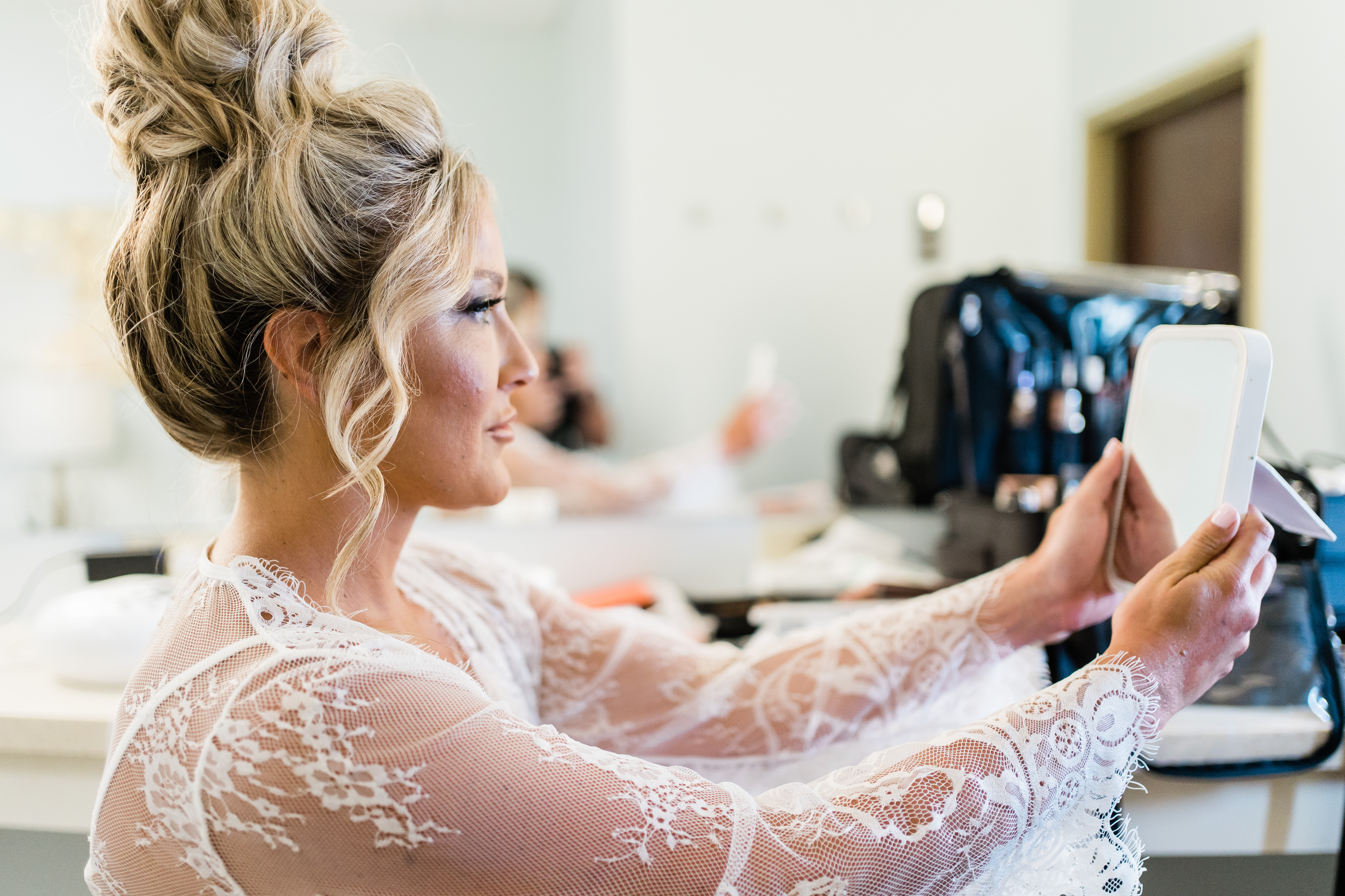 Indiana wedding photographer captures bride getting ready before modern ohio golf course wedding