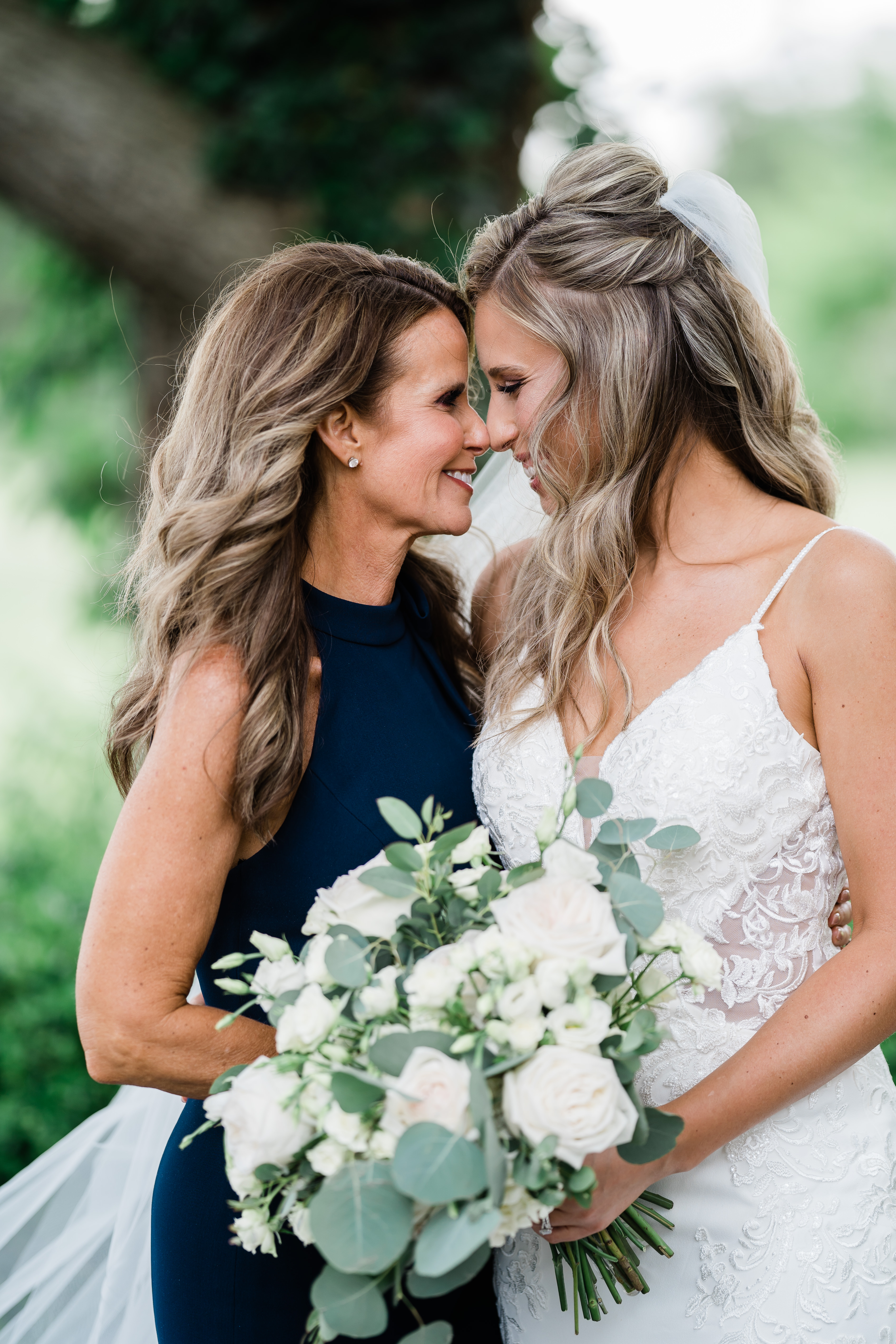 bride with mother nose to nose