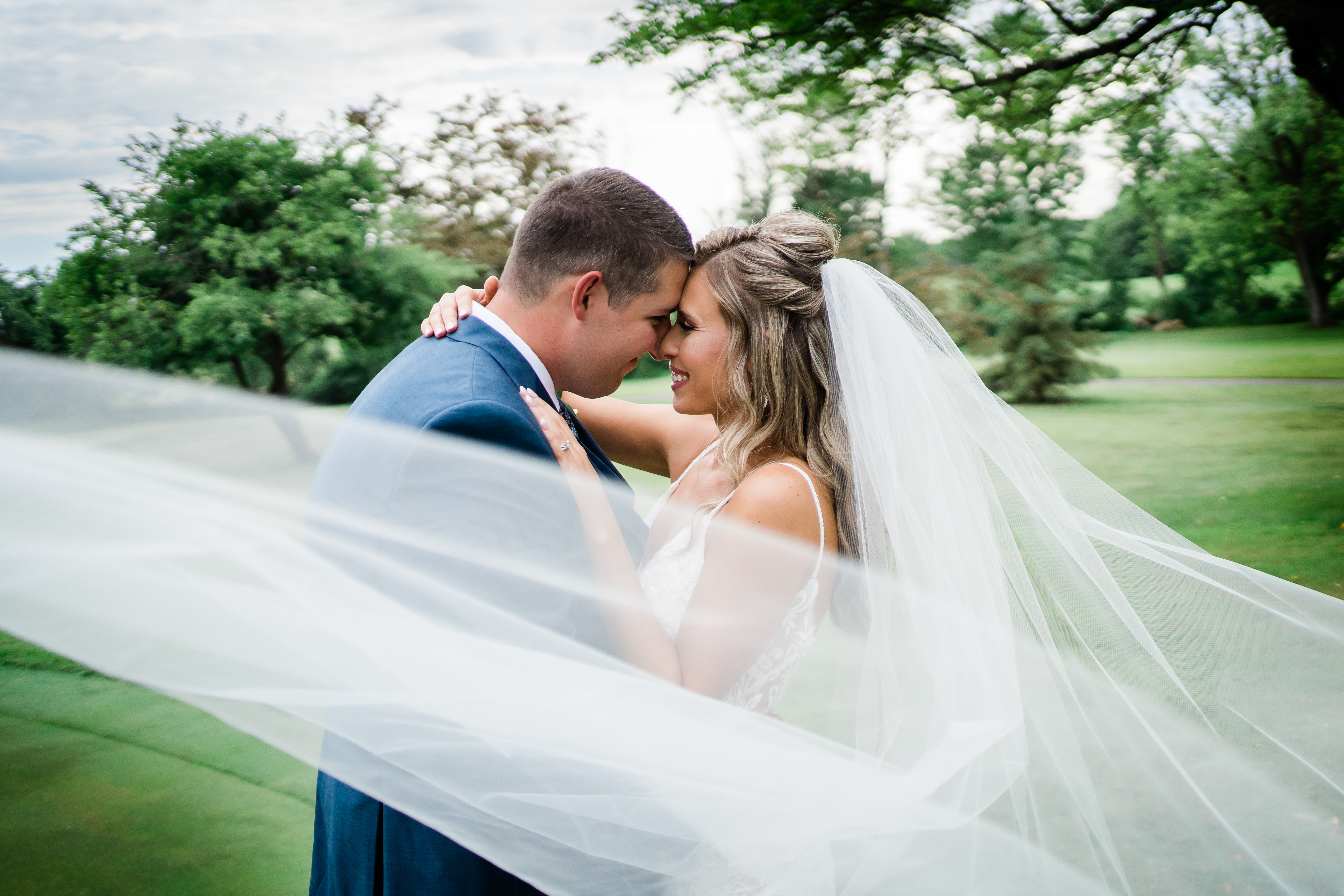 Fort wayne wedding photographer captures bride and groom embracing