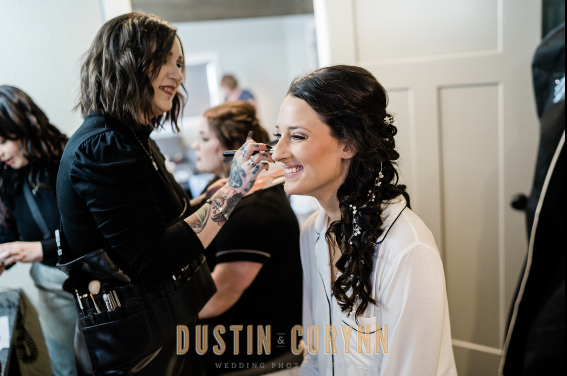 Fort Wayne wedding photographer captures bride getting makeup done on wedding day