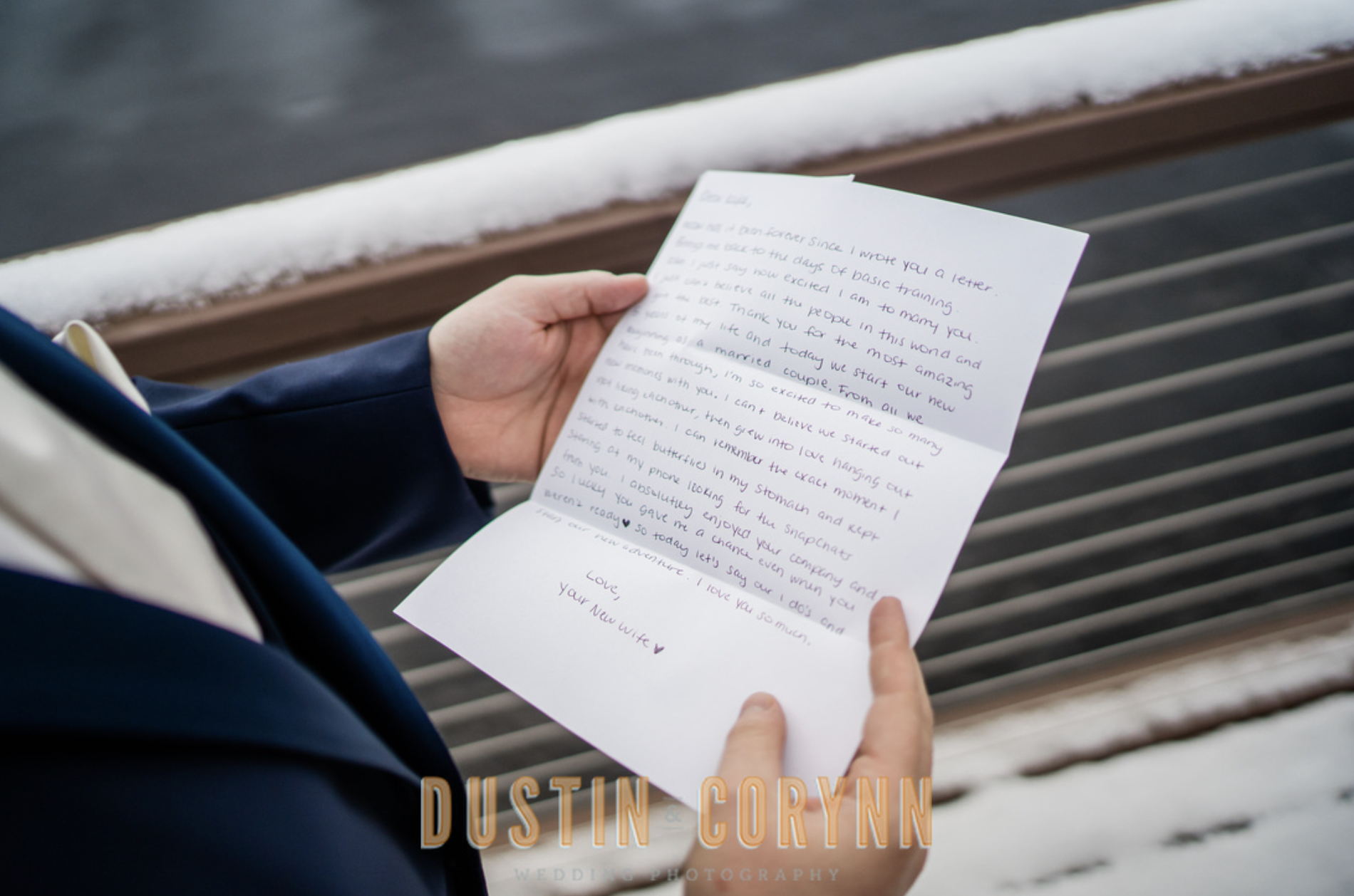 Fort Wayne wedding photographer captures groom holding letter from bride at Union 12 fort wayne wedding 