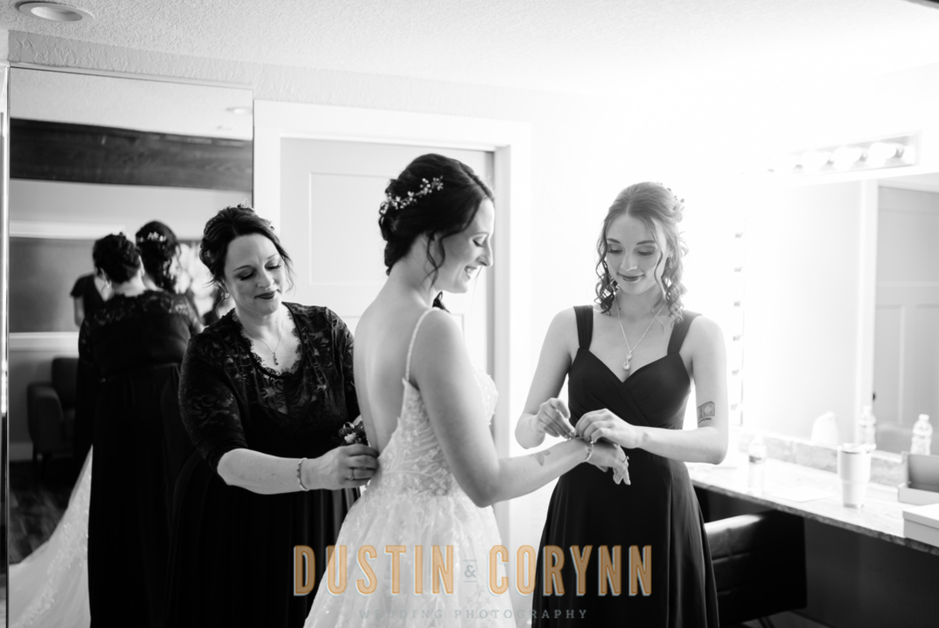 Fort Wayne wedding photographer captures bride getting accessories put on