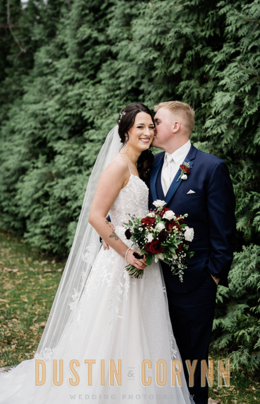 bride and groom embracing during outdoor bridal portraits