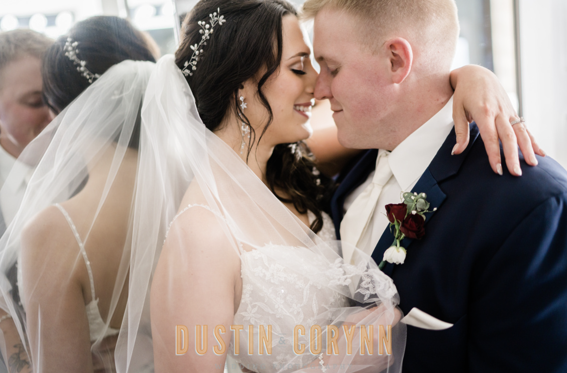 bride and groom embracing during bridal portraits