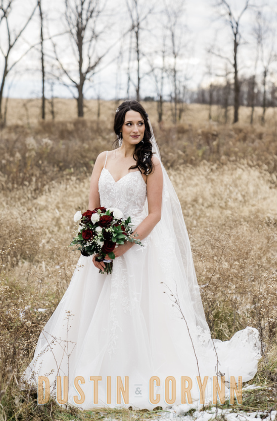 bride wearing strapless wedding gown holding bridal bouquet